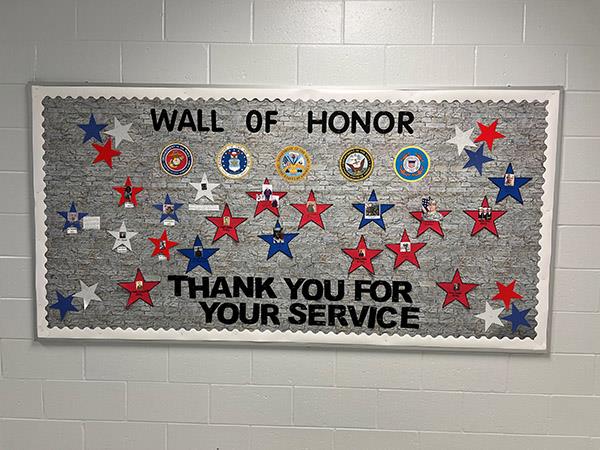 East Lake Middle School observed Veterans Day by setting up a Wall of Honor to celebrate their active and retired military families.